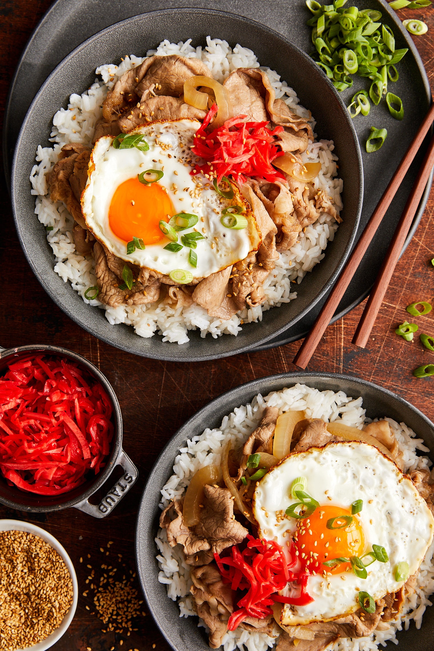 Gyudon (Japanese Beef Rice Bowl) - A weeknight favorite with thinly sliced beef + tender onions in a sweet and savory sauce! So quick + easy!