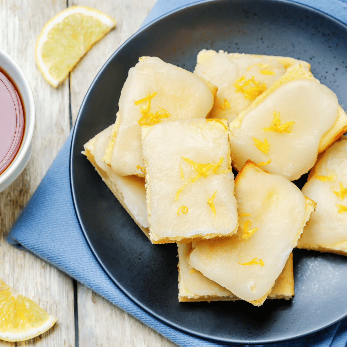 Overhead image of Lemon Brownies on a blue plate