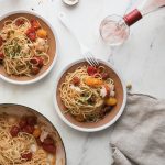 Lobster Pasta with Cherry Tomatoes on two plates.