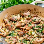 chicken with 40 cloves of garlic in a Dutch oven.