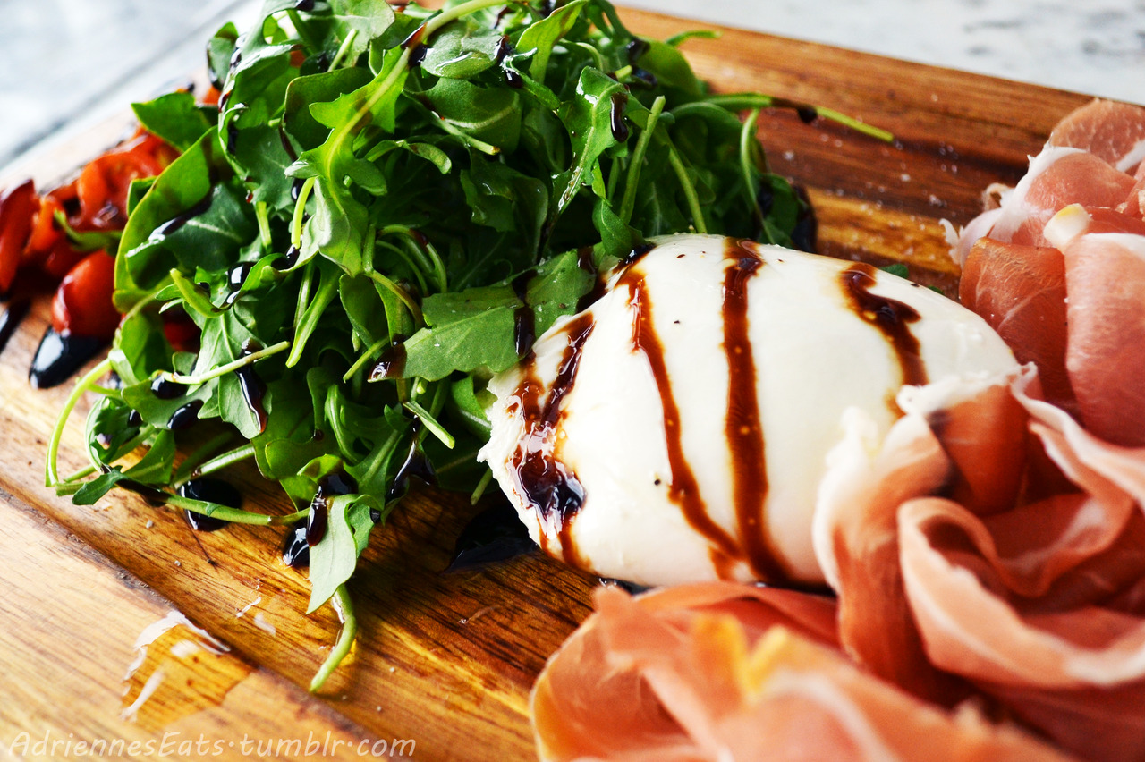 Burrata Mozzarella, Prosciutto, Arugula, and Tomatoes with Drizzled Balsamic Reduction from Lynora’s in Jupiter, FL