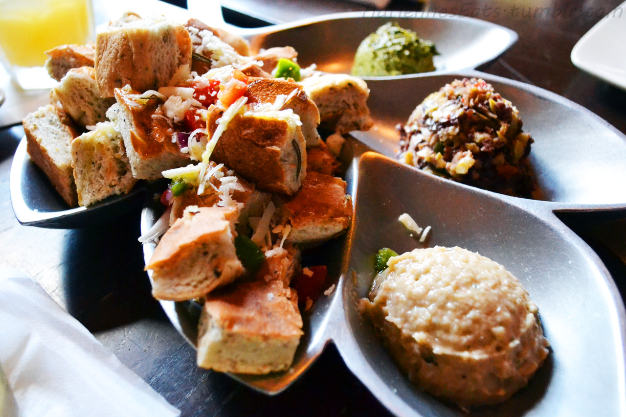 Tuscan White Bean and Roasted Garlic Spread, Olive Tapanade, and Fresh Herb Pesto with Toasted Homemade Artisan Bread from Sangrias Wine and Tapas Bar in St. Augustine, FL