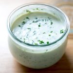 A jar of vegan ranch dressing.