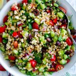 Square photo of a bowl of couscous salad.