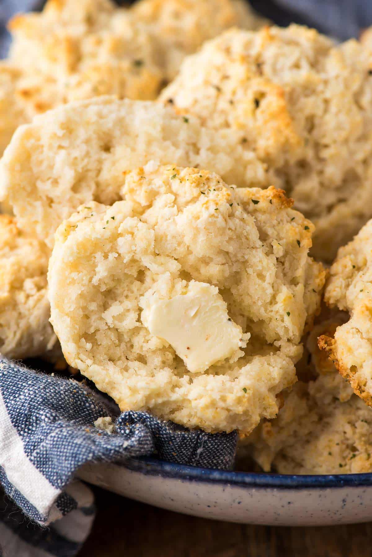 Drop biscuit split in half with a pat of butter on it.