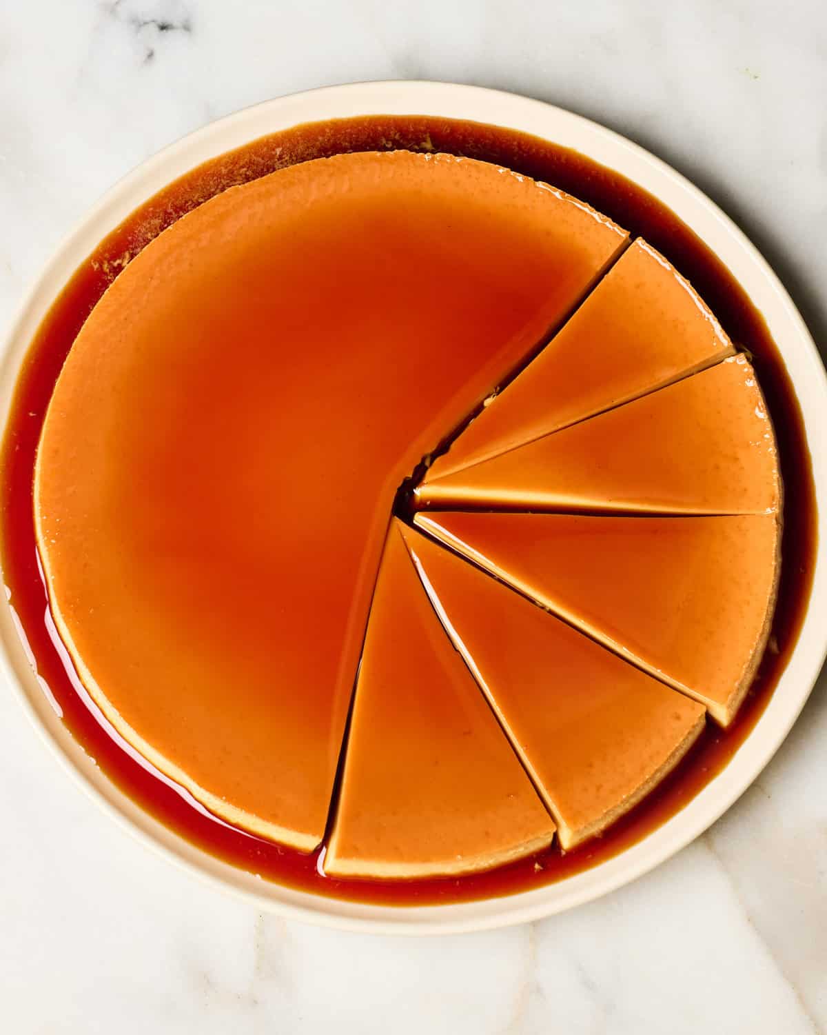 Flan sliced on a plate.