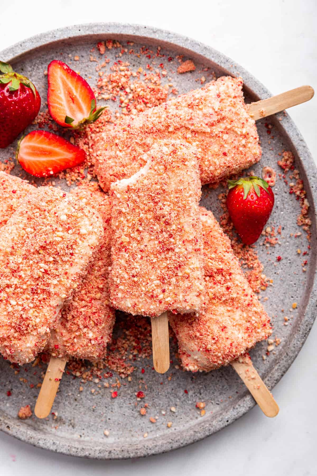 Strawberry shortcake ice cream bars on plate